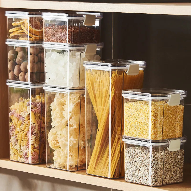 Kitchen countertop with sealed glass jars containing various ingredients, showcasing an organized and stylish storage solution.