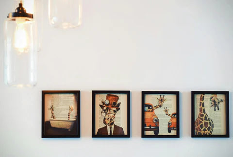 Cozy living room with a neutral-toned sofa and a stylish gallery wall featuring three woven decorative plates, adding a touch of texture and natural warmth to the space.