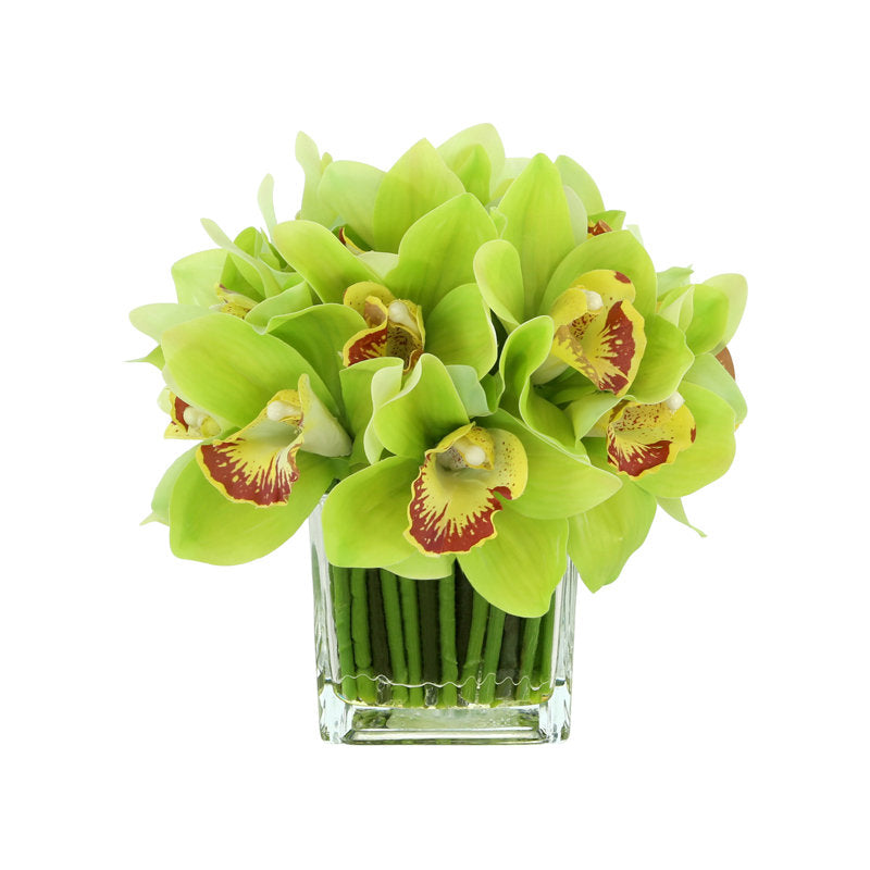 Orchid Flowers In Glass Vase