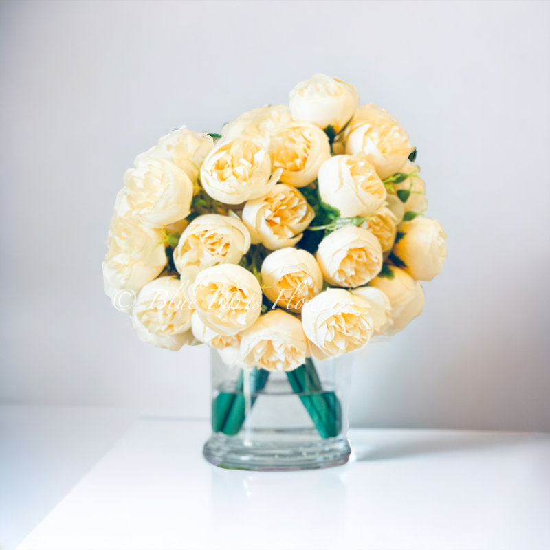 Yellow Peony Flowers In Vase